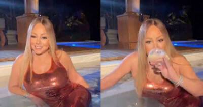Mariah Carey celebrated the anniversary of her album by wearing a gown in her pool - www.msn.com - Ireland - Bahamas - Morocco - city Monroe