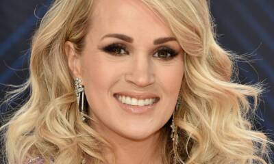 Carrie Underwood looks breathtaking in sheer ballgown during special performance - hellomagazine.com
