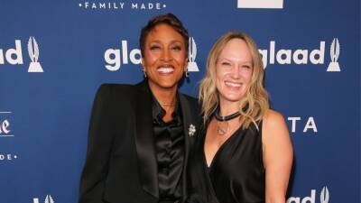 Robin Roberts Shares Why Partner Amber Laign's Treatment Was Suspended Amid Cancer Battle (Exclusive) - www.etonline.com