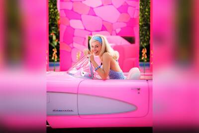Margot Robbie transforms into Barbie, rides in pink convertible for film - nypost.com - Las Vegas