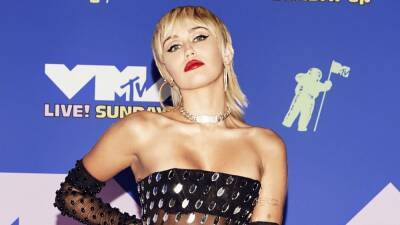 Miley Cyrus Tests Positive for COVID-19, Assures Fans She's 'Feeling Fine' - www.etonline.com