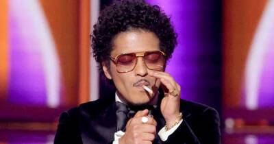 Grammys audience reacts to Bruno Mars lighting cigarette after award win: ‘Can I bum a smoke?’ - www.msn.com - USA - Ukraine