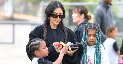 Kim Kardashian dresses down and wears pigtails for son Saint's soccer game - www.ok.co.uk - Los Angeles - Miami - California - Chicago