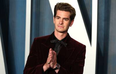 Andrew Garfield finally reveals who he was texting following Oscars slap - www.nme.com