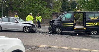Emergency crews race to head-on smash between taxi and car in Glasgow - www.dailyrecord.co.uk - Scotland