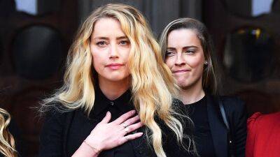 Amber Heard's Sister Whitney Alleges Johnny Depp Hit Her in Trial Testimony - www.etonline.com - Virginia - county Fairfax