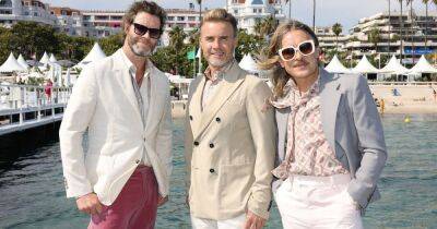 Take That's Mark Owen looks unrecognisable as he joins bandmates Gary and Howard in Cannes - www.ok.co.uk - France - county Howard - city Gary