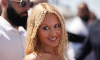 Kylie Minogue resembles a rock goddess in black mini dress - hellomagazine.com