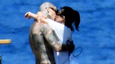 Kourtney Kardashian and Travis Barker Share a Kiss in Italy Ahead of Wedding Day - www.etonline.com - California - Italy - Santa Barbara