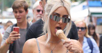 Kim Kardashian tucks into ice cream during stroll in Italy hours before Kourtney wedding - www.ok.co.uk - Italy - Las Vegas - county Brown