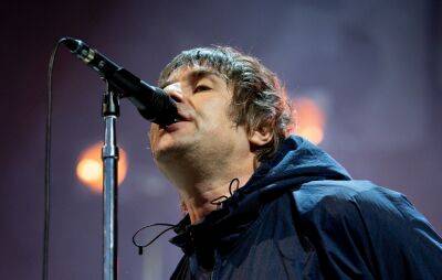 Liam Gallagher says Oasis “piss all over the Beatles” during Twitter scrap with Jamie Carragher - www.nme.com - Manchester