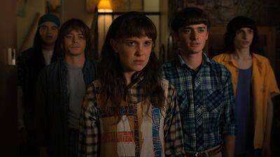 'Stranger Things' Cast Says Everyone Is in 'Real Danger' in 'Massive' Season 4 (Exclusive) - www.etonline.com - California - Indiana - county Hawkins