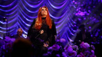 Wynonna Judd Keeps Promise to Continue Singing After Mom Naomi's Death With New Song 'Other Side' - www.etonline.com