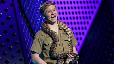 Watch Robert Irwin Wrangle a Snake From the Road Bare-Handed - www.etonline.com - Australia