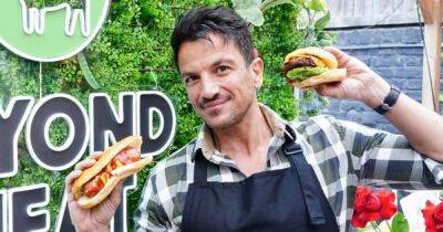 Peter Andre grills a sausage days after 'chipolata-gate' in cheeky new advert - www.ok.co.uk - Britain - Beyond