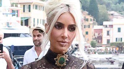 Kim Kardashian Rewore Two Dresses at Once for Kourtney Kardashian's Italian Wedding - www.glamour.com - London - Italy - county Love