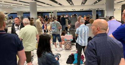 'Hundreds' of TUI passengers told by TEXT their holiday is cancelled after 'eight-hour' Manchester Airport wait - www.manchestereveningnews.co.uk - Manchester