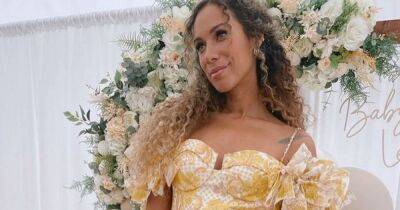 Pregnant Leona Lewis cradles her growing bump in yellow dress at her baby shower - www.ok.co.uk - city Sanctuary
