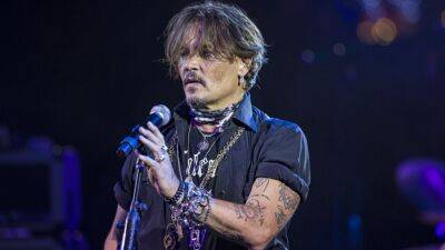 Johnny Depp Surprises Crowd at Jeff Beck Concert in England After Defamation Trial - www.etonline.com - Washington - Virginia - county Heard - county Fairfax