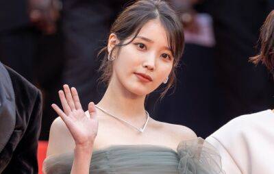 IU says she was “overwhelmed” playing a single mother in the film ‘Broker’ - www.nme.com