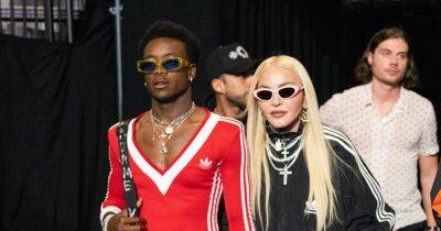 Madonna's son David Banda, 16, shows off epic style in red dress as pair attend boxing match - www.ok.co.uk - USA - city Brooklyn - Indiana - Malawi - Adidas