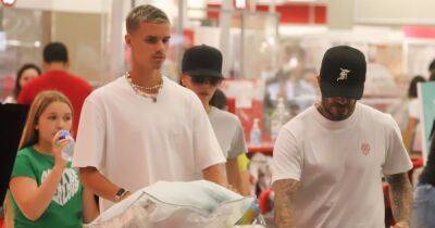 David and Victoria Beckham stock up at Target as they enjoy family shopping - www.ok.co.uk - Britain - city Sandra
