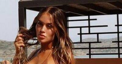Pregnant Lottie Tomlinson shows off blossoming baby bump in bikini on Greece holiday - www.ok.co.uk - Greece - county Story