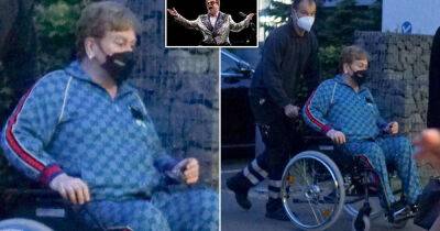 Frail-looking Elton John, 75, is pushed in a wheelchair - www.msn.com - city Florence
