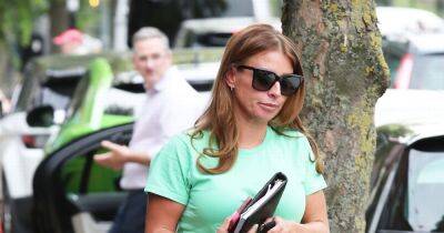 Coleen Rooney styles out medical boot for injury with denim shorts as she emerges from hair salon - www.manchestereveningnews.co.uk - Britain - London - Manchester - county Cheshire