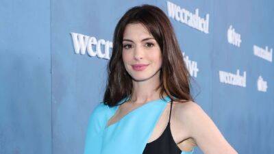Anne Hathaway Answers Questions From Celebrity Friends About BDE, Canceled Stars and Fashion Regrets - www.etonline.com