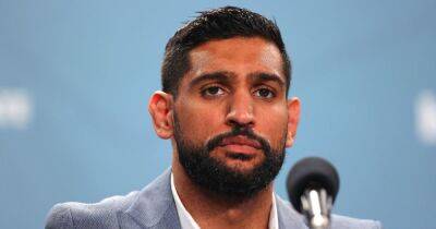 Three men arrested after Amir Khan robbed at gunpoint for £72k watch - www.manchestereveningnews.co.uk - Britain - Scotland - London
