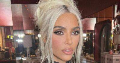 Kim Kardashian gets a blunt blonde bob and fans wonder if it's to hide bleach damage - www.ok.co.uk - county Long