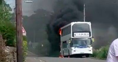 School bus bursts into flames on Scots road as fire crews race to scene - www.dailyrecord.co.uk - Britain - Scotland - Lithuania