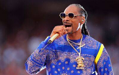 Snoop Dogg reacts after impersonator hired for NFT conference - www.nme.com - Britain