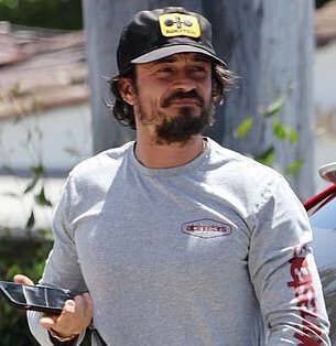 Orlando Bloom rocks scruffy beard while out in teeny shorts - www.msn.com - Britain - Houston - city Sangster