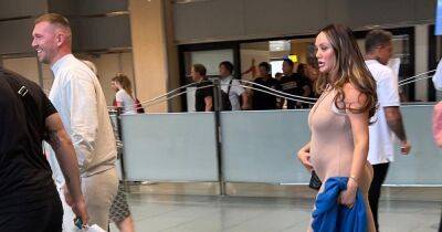 Charlotte Crosby embraces blossoming bump in figure hugging bodysuit as she jets to Ibiza - www.ok.co.uk - Spain - county Crosby