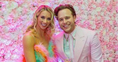 Olly Murs engaged to love Amelia Tank after romantic beach proposal - www.msn.com - Britain