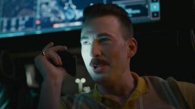 Ryan Gosling Makes Fun of Chris Evans’ ‘Trash-Stache’ in First ‘The Gray Man’ Clip (Video) - thewrap.com