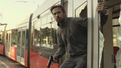 Ryan Gosling Meets Chris Evans' Deranged Assassin in New 'The Gray Man' Clip - www.etonline.com - county Evans
