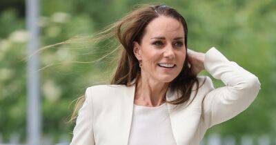 Kate Middleton grapples with wind and smooths hair down during stylish appearance - www.ok.co.uk - Britain - city Sheffield