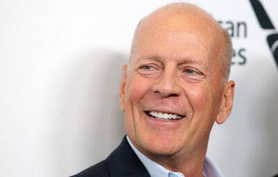 Bruce Willis visits ‘Die Hard’ set 34 years later following aphasia diagnosis - www.nme.com - California