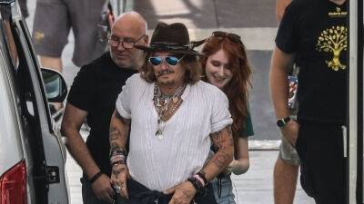 Johnny Depp's redheaded mystery woman's identity revealed - www.foxnews.com - France - Italy