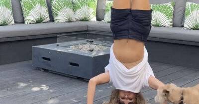 Amanda Holden fans in stitches as her dog is completely confused by her being upside down - www.msn.com