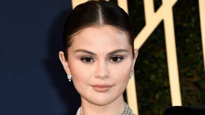 Selena Gomez Just Debuted Curly Bangs and They Look Amazing - www.glamour.com - London