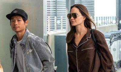 Angelina Jolie & Pax board a flight in their pajamas - us.hola.com - London