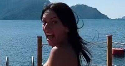 Davina McCall, 54, twerks in yellow bikini after opening up on 'accepting herself' - www.ok.co.uk