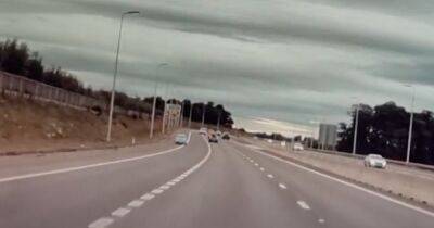 Driver filmed speeding down wrong side of Scots motorway in heart-stopping footage - www.dailyrecord.co.uk - Scotland