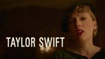 See Taylor Swift in a 1930's Red Lip in the Trailer for Amsterdam - www.glamour.com - USA - Taylor - county Swift - Washington - city Amsterdam - county Christian - Austin, county Swift