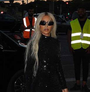 Kim Kardashian dazzles in sequinned floor-length black fishtail gown - www.msn.com - France