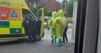 'Don't panic', say bosses at Royal Oldham Hospital after concerned patients spot medics in Hazmat suits - www.manchestereveningnews.co.uk - Manchester